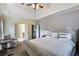 Spacious main bedroom featuring a tray ceiling and ensuite bathroom access at 168 Gatlin Ridge Run, Dallas, GA 30157
