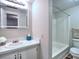 Clean bathroom featuring white vanity, large mirror, and a shower-tub combo with white tiling at 1808 Jacksons Creek Dr, Marietta, GA 30068