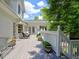 Inviting outdoor deck with comfortable seating, potted plants, and a serene view of the surrounding greenery at 1808 Jacksons Creek Dr, Marietta, GA 30068