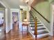 Inviting foyer with hardwood floors, staircase, and elegant trim at 1808 Jacksons Creek Dr, Marietta, GA 30068