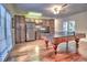 Entertaining game room featuring a ping pong table, hardwood floors, and access to a kitchenette at 1808 Jacksons Creek Dr, Marietta, GA 30068