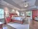 Spacious main bedroom features a trey ceiling, hardwood floors and a sitting area at 1808 Jacksons Creek Dr, Marietta, GA 30068