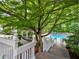 Beautiful backyard view showing a gazebo and inviting pool with a wood deck, perfect for relaxation at 1808 Jacksons Creek Dr, Marietta, GA 30068