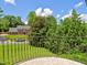 Enjoy the beautiful view of the well-manicured yard from the balcony of this beautiful home at 1808 Jacksons Creek Dr, Marietta, GA 30068