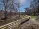 Community walking path and foot bridge through landscaped surroundings at 1808 Jacksons Creek Dr, Marietta, GA 30068