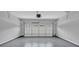 Open garage with epoxy floors at 2165 Capella Cir, South Fulton, GA 30331