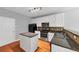 Modern kitchen features white cabinets, stainless steel appliances, and an island with brown countertop at 2165 Capella Cir, South Fulton, GA 30331