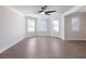 Bright bedroom with tray ceilings and large windows filling the room with natural light at 4436 Hosch Reserve Ct, Buford, GA 30519