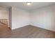 Bedroom featuring neutral walls and hardwood floors at 4436 Hosch Reserve Ct, Buford, GA 30519