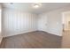 Bedroom featuring neutral walls and hardwood floors at 4436 Hosch Reserve Ct, Buford, GA 30519