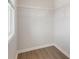 Simple walk-in closet with a window and wire shelving for storage at 4436 Hosch Reserve Ct, Buford, GA 30519