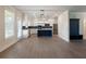Open-concept kitchen featuring an island, stainless steel appliances, and ample counter space at 4436 Hosch Reserve Ct, Buford, GA 30519