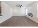 Open-concept living room with modern fireplace and abundant natural light at 4436 Hosch Reserve Ct, Buford, GA 30519