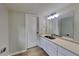 New bathroom featuring modern vanity, framed mirror, and neutral wall color at 1102 Tony Valley Dr, Conyers, GA 30013