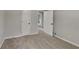 Bedroom with neutral paint, carpet, and white trim with doors and closets at 1102 Tony Valley Dr, Conyers, GA 30013