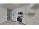 Modern kitchen equipped with stainless steel appliances and white cabinetry at 1102 Tony Valley Dr, Conyers, GA 30013