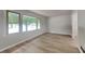 Spacious living room featuring new floors and an abundance of natural light at 1102 Tony Valley Dr, Conyers, GA 30013