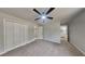 Bright bedroom with new carpet, neutral paint, and walk-in closet at 1102 Tony Valley Dr, Conyers, GA 30013