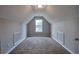 Bonus room with lots of natural light, carpeted floors, and minimalist design at 2428 Harmony Ridge Ct, Lithonia, GA 30058