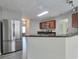 Kitchen featuring stainless steel appliances and bar seating at 2428 Harmony Ridge Ct, Lithonia, GA 30058