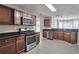 Modern kitchen with stainless steel appliances and granite countertops at 2428 Harmony Ridge Ct, Lithonia, GA 30058
