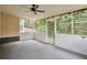 Relaxing screened-in sunroom with views of backyard, perfect for enjoying the outdoors at 2428 Harmony Ridge Ct, Lithonia, GA 30058