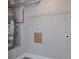 Utility room featuring a water heater, storage shelves, and washer-dryer hookups at 2428 Harmony Ridge Ct, Lithonia, GA 30058
