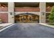 Garage entrance features a metal security gate with a 7' clearance at 3180 Mathieson Drive # 703, Atlanta, GA 30305