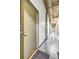 Hallway features a unit door with concrete floors and exposed piping at 3180 Mathieson Drive # 703, Atlanta, GA 30305