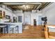 Eat-in kitchen features island with seating, white cabinets and stainless steel appliances at 3180 Mathieson Drive # 703, Atlanta, GA 30305