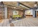 Lobby area features brick walls, tile floors, seating, and modern decor at 3180 Mathieson Drive # 703, Atlanta, GA 30305