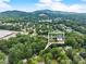 Aerial view of home in established neighborhood with lush trees offering a serene environment at 4990 Turtle Rock Drive Dr, Marietta, GA 30066