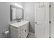 Bathroom features a marble vanity, white trim, and neutral paint at 4990 Turtle Rock Drive Dr, Marietta, GA 30066