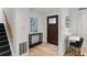 Bright entryway with a decorative door, complemented by stylish furnishings and modern decor at 4990 Turtle Rock Drive Dr, Marietta, GA 30066