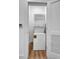 Efficient laundry area with stacked washer and dryer units, maximizing space in the home at 112 Rogers Street Ne # 503, Atlanta, GA 30317
