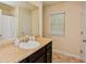 Bathroom with single vanity, granite countertop, and tiled flooring at 2010 Shortleaf Rd, Fairburn, GA 30213