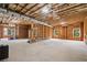 Unfinished basement with exposed beams and ductwork offers lots of potential at 4445 Pebble Rock Dr, Cumming, GA 30041