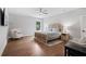Serene bedroom featuring a decorative rug, natural light, and neutral colors at 4445 Pebble Rock Dr, Cumming, GA 30041