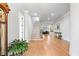 Welcoming foyer featuring hardwood floors, staircase, and elegant decor at 4445 Pebble Rock Dr, Cumming, GA 30041