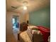 Bedroom featuring a ceiling fan and a view into another room, awaiting personalized finishing touches and décor at 713 Pine Chase Ct, Lawrenceville, GA 30043