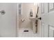 A bathroom with white subway tile and a pedestal sink at 1718 Ridgewood Ne Dr, Atlanta, GA 30307