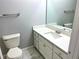 Bathroom featuring toilet, single vanity, and tile flooring at 203 Galway Ln, Hampton, GA 30228