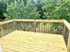 Back deck overlooking the greenery at 203 Galway Ln, Hampton, GA 30228