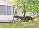 Backyard featuring a charming patio and beautiful landscaping, perfect for outdoor enjoyment at 3041 Regal Dr, Mcdonough, GA 30253