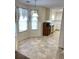 Eat-in kitchen area with bright lighting, neutral flooring, and plenty of natural light at 3041 Regal Dr, Mcdonough, GA 30253