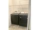 Laundry room featuring newer appliances and built-in shelving at 3041 Regal Dr, Mcdonough, GA 30253