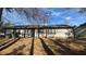 Rear exterior with patio and outdoor cooking area at 5359 Stafford Nw Dr, Lilburn, GA 30047