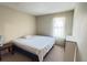 Bright bedroom with carpeted floors and window for natural light at 5359 Stafford Nw Dr, Lilburn, GA 30047