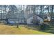 Charming single-story home featuring stone accents, attached garage, and a well-maintained front lawn at 5359 Stafford Nw Dr, Lilburn, GA 30047