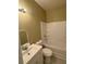Bright bathroom with white vanity, framed mirror, toilet and tub with shower at 2895 Brandl Cove Ct # 4, Marietta, GA 30067